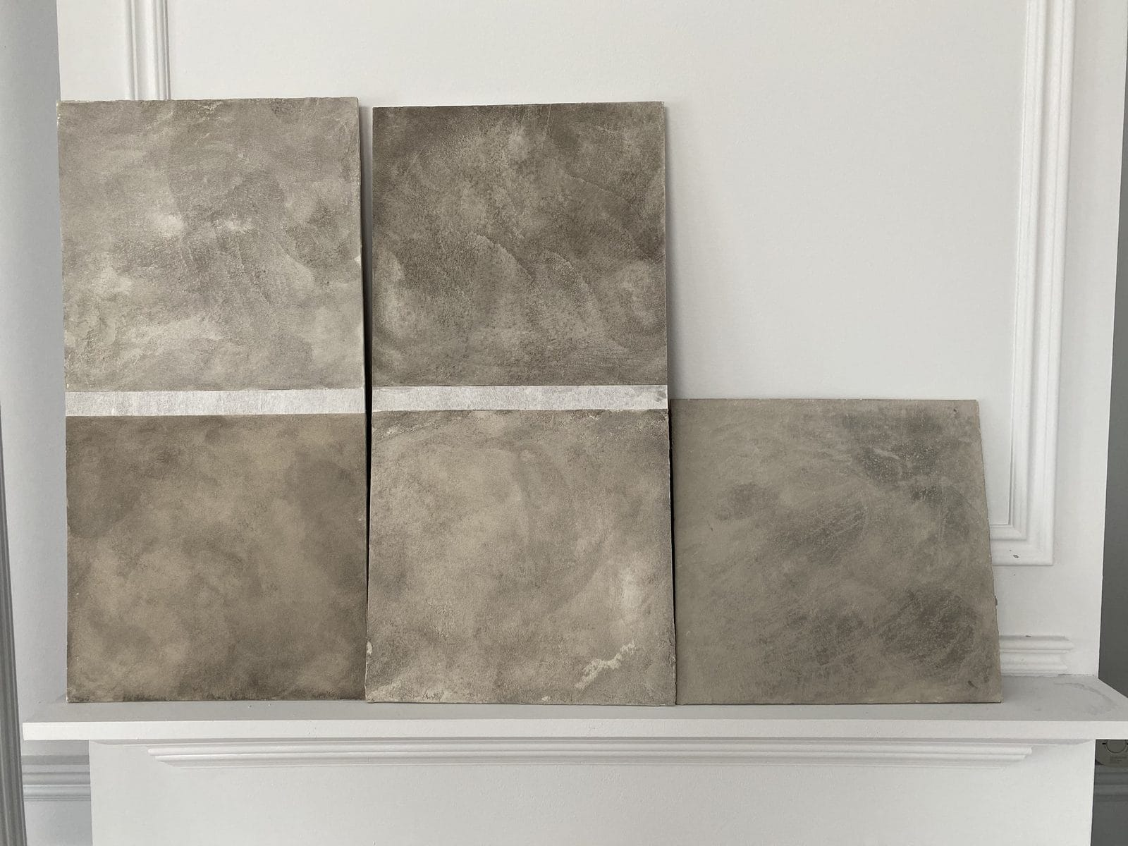 Venetian plaster wall finish showing layered application technique with subtle light reflection and polished trowel marks